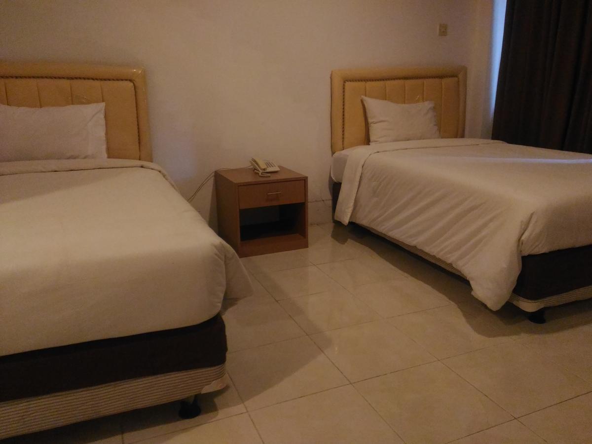 Grand Royal Taliwang Hotel Quarto foto