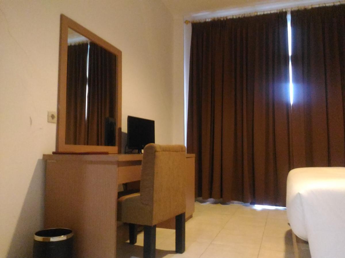 Grand Royal Taliwang Hotel Quarto foto